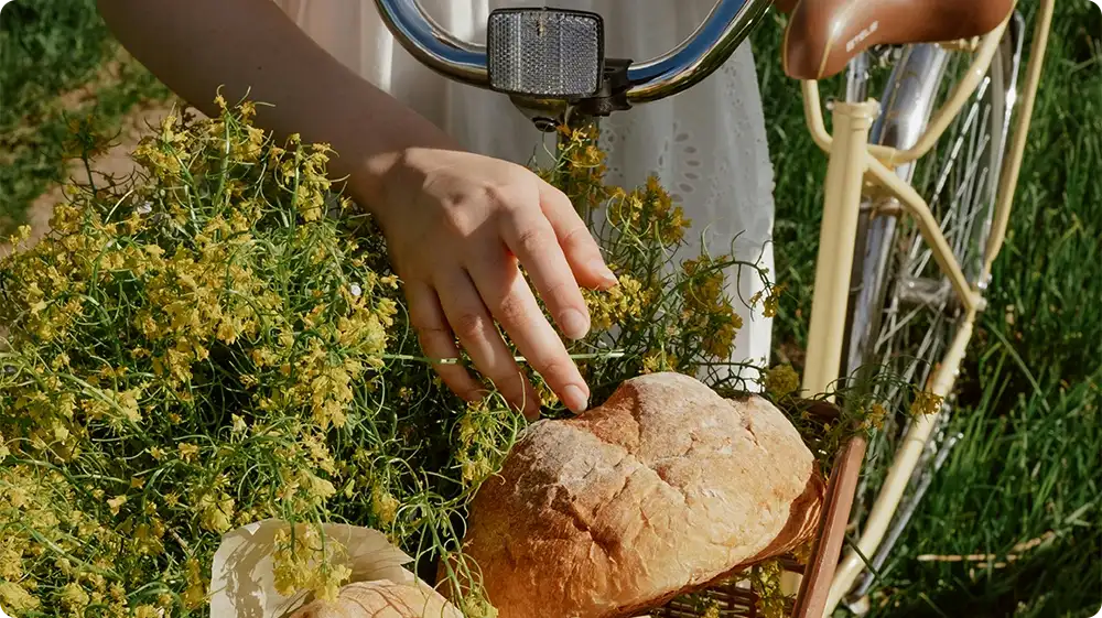 Woman holding a basket of bread illustrating how flavour connects with mood, memory, and sensory experience