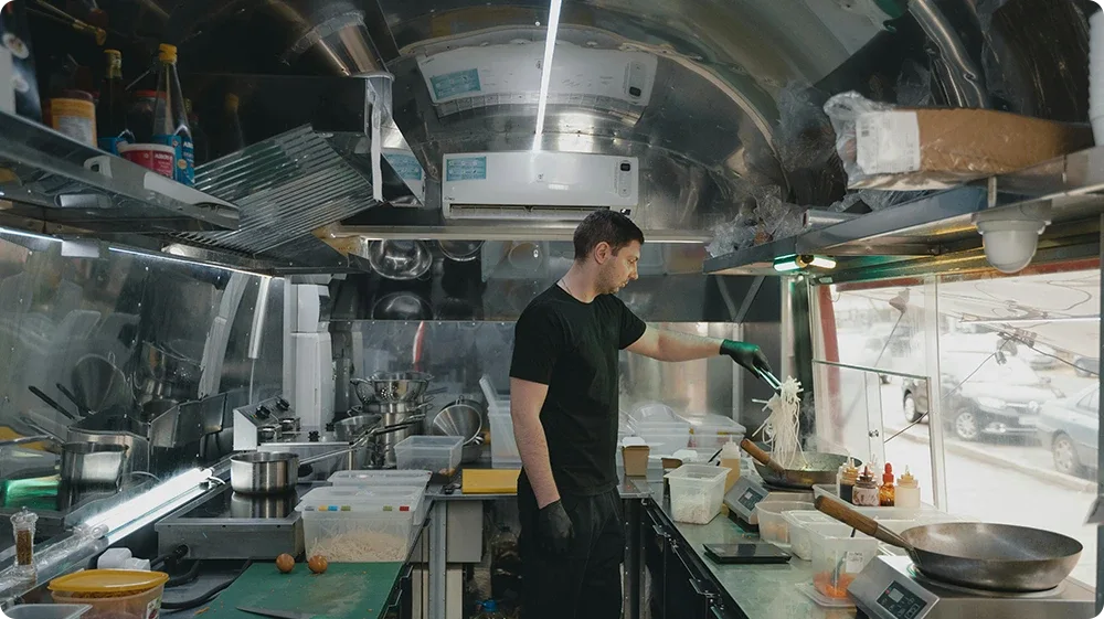 A Man starting a food business in a mobile kitchen in the UK