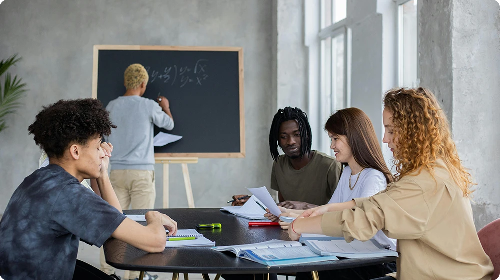 Adult learners participating in a classroom discussion.