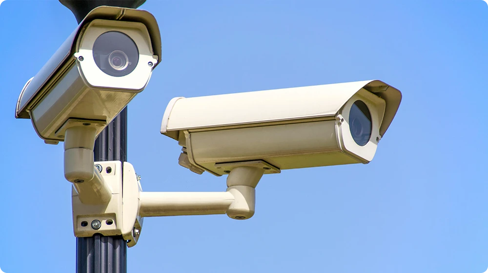 Two CCTV cameras monitoring a road highlighting the question, do these CCTV cameras have audio