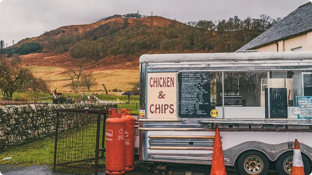 Street food truck selling chicken and chips in the UK countryside  example of a mobile food business