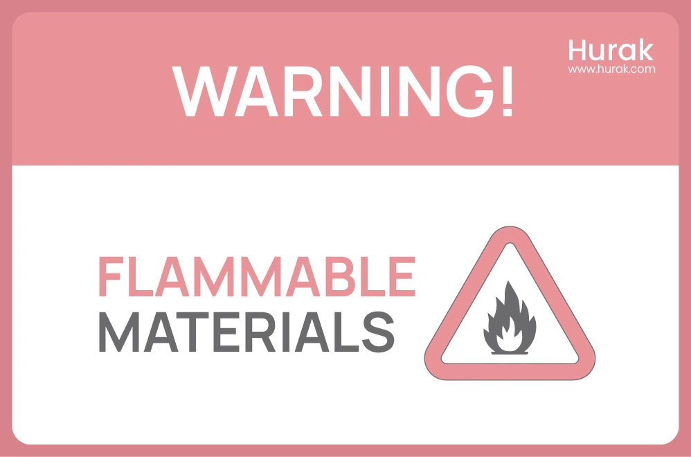 Red warning sign displaying a flammable materials symbol, used to indicate the presence of substances that can easily catch fire and require careful handling.