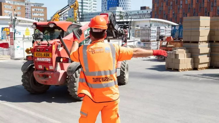 traffic banksman giving signals