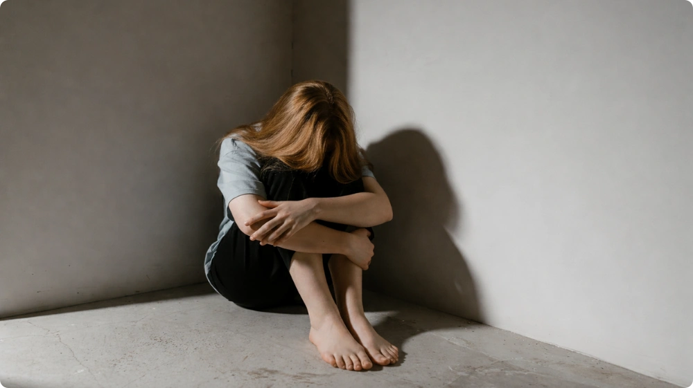 Illustration showing a distressed woman, symbolising common phobias.
