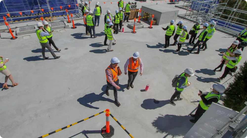 Team attending a safety briefing highlighting the importance of OHS.